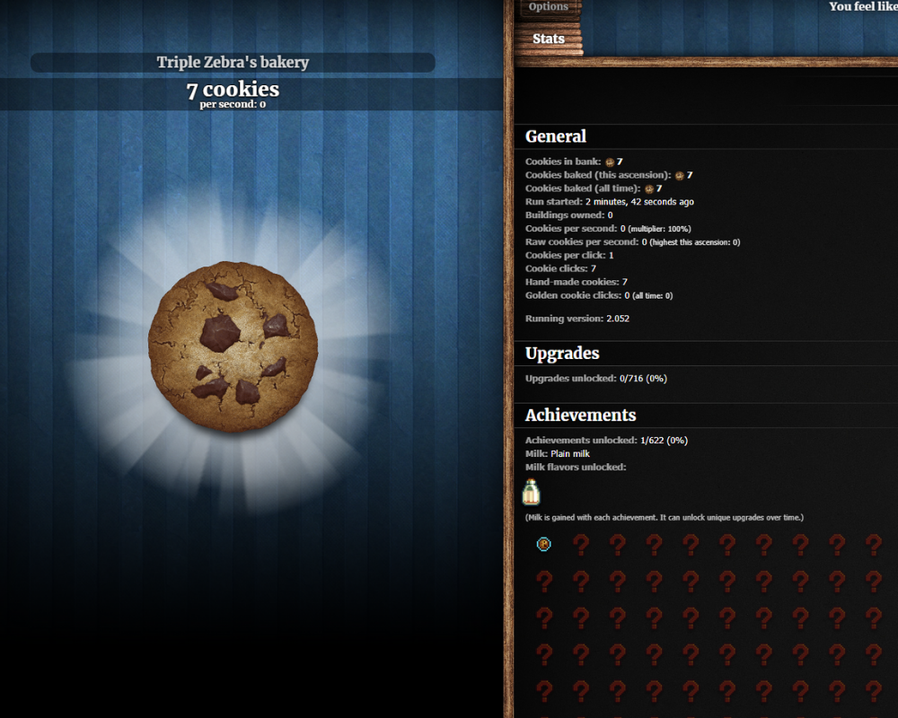 Cookie Clicker game screen with giant cookie and upgrades